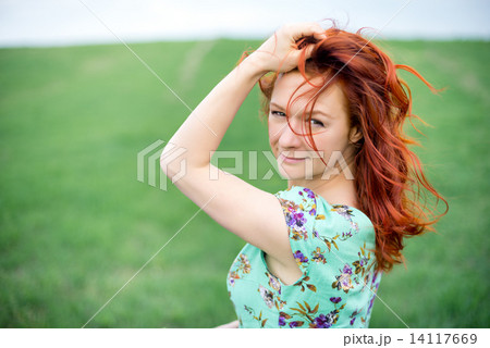 Beautiful portrait of woman in the park 14117669