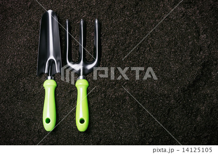 Gardening tools on a background on the ground 14125105