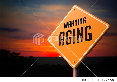 Aging on Warning Road Sign. 14127450