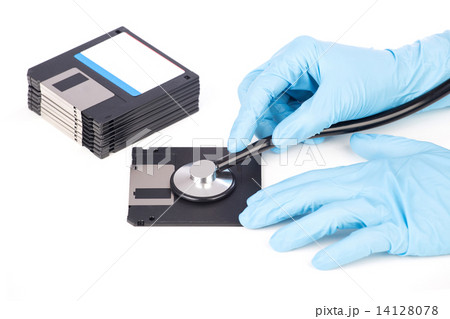 hand with a stethoscope on floppy disk hand with a stethoscope on floppy disk 14128078