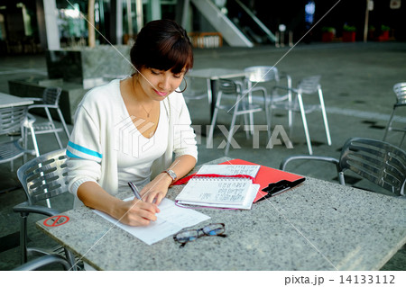 Young female pan-asian student in campus Young female pan-asian student in campus 14133112