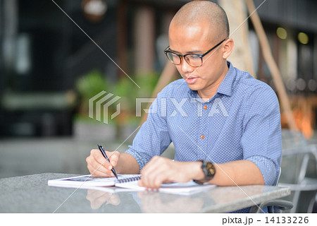 Young male adult student in campus 14133226