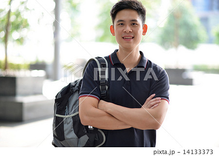 Young male adult student in campus Young male adult student in campus 14133373