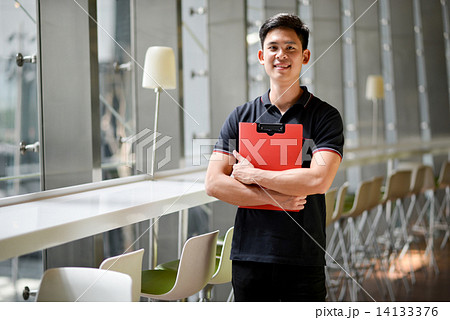 Young male adult student in campus 14133376