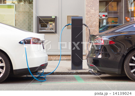 Electric Cars in Charging Station. Electric Cars in Charging Station. 14139024