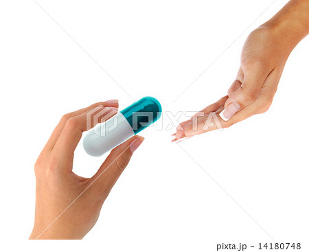 hand gives a big pill 14180748