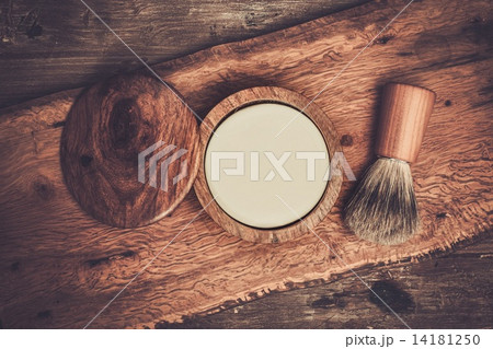 Shaving brush and soap on a luxury wooden background Shaving brush and soap on a luxury wooden background 14181250
