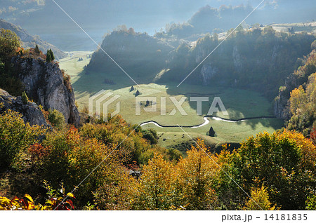 Autumn mountain landscape with a small meandering water stream 14181835