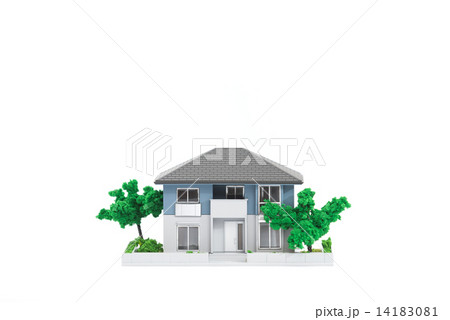 Miniature house on isolated white background Miniature house on isolated white background 14183081