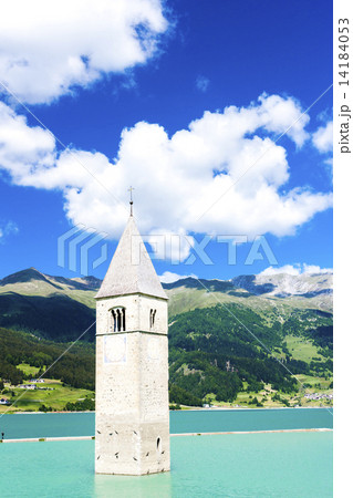 tower of sunken church in Resia lake, South Tyrol, Italy tower of sunken church in Resia lake, South Tyrol, Italy 14184053