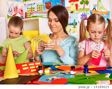Child cutting out scissors paper. 14189025