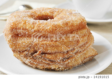 coffee and croissant-doughnut pastries sprinkled with sugar 14191015