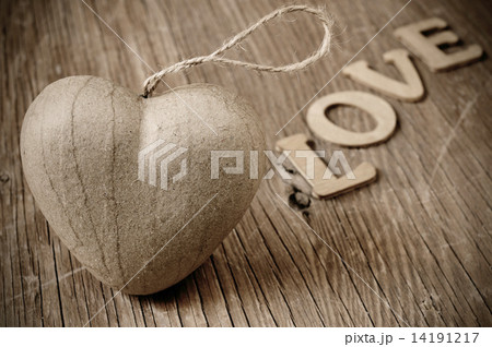 heart and letters forming the word love, in sepia toning heart and letters forming the word love, in sepia toning 14191217