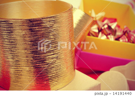 boxes, golden ribbons and ribbon bows 14191440