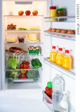 Open fridge filled with food 14200025