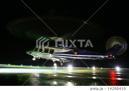 Helicopter landing on oil and gas platform in night time for training. New pilot traning landing on  14200410