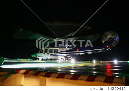 Helicopter landing on oil and gas platform in night time for training. New pilot traning landing on  14200412