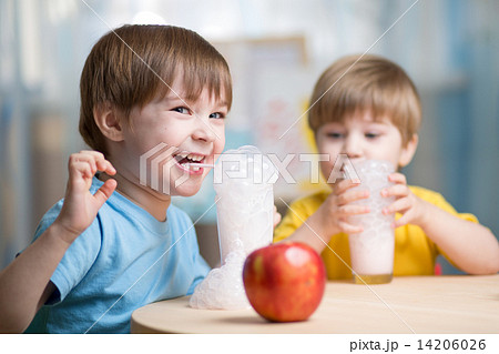 children drinking milk at home children drinking milk at home 14206026