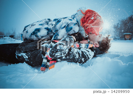 Happy Young Couple in Winter Park having fun.Family Outdoors. love kiss 14209950