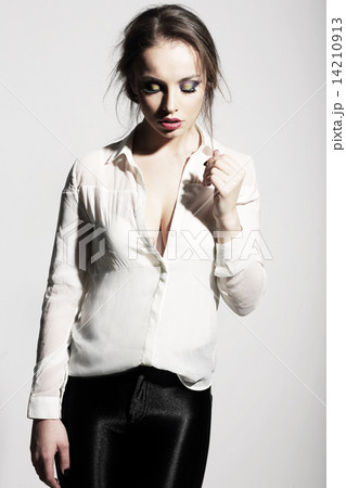 Thinking Seductive Woman in White Blouse 14210913