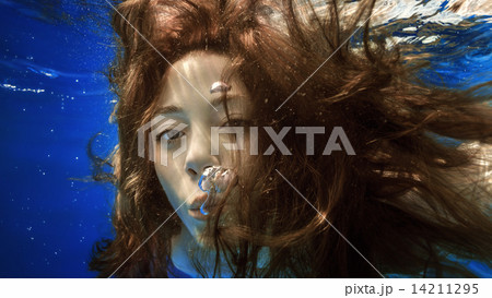 Portrait of a girl under water Portrait of a girl under water 14211295