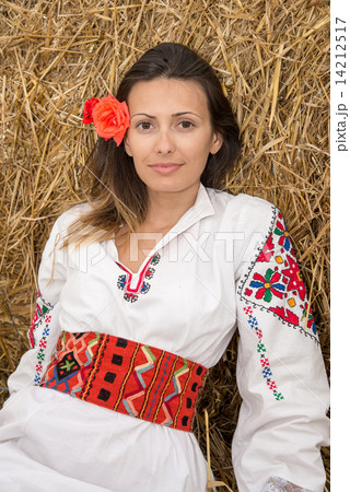 Young woman with national costume from Bulgaria Young woman with national costume from Bulgaria 14212517