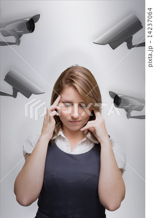 Composite image of businesswoman with headache 14237064