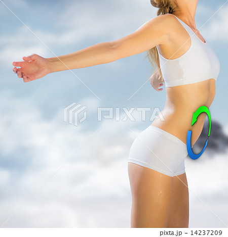 Composite image of gorgeous fit blonde standing with arms out 14237209