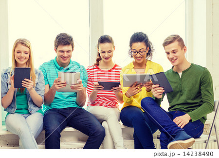 smiling students with tablet pc computer smiling students with tablet pc computer 14238490