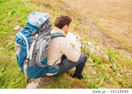man with backpack hiking 14238986