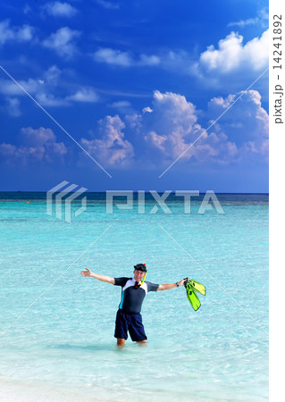 man in the sea with the equipment for a snorkeling.. 14241892
