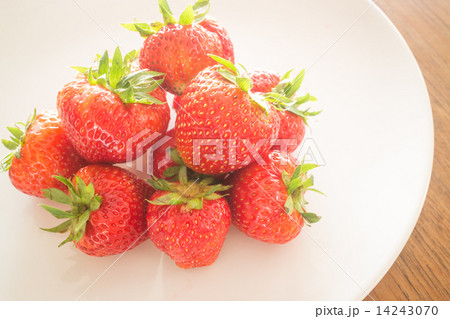 Fresh ripe strawberries on white plate Fresh ripe strawberries on white plate 14243070
