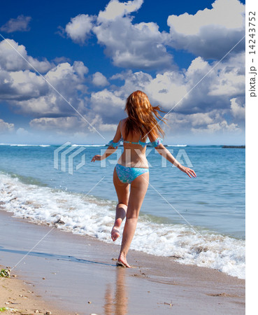 The young attractive woman on the sea coast The young attractive woman on the sea coast 14243752