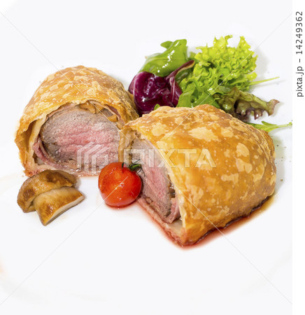 beef in pastry with salad on the table in a restaurant beef in pastry with salad on the table in a restaurant 14249362