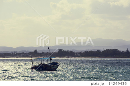 Boat floating on the waves of the sea Boat floating on the waves of the sea 14249436
