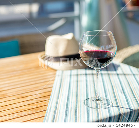 Glass of wine on the table Glass of wine on the table 14249457