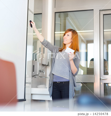 Businesswoman giving a talk. 14250478