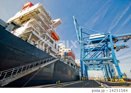 Container Cargo operation in busy Port Terminal with Ship moored alongside 14251564