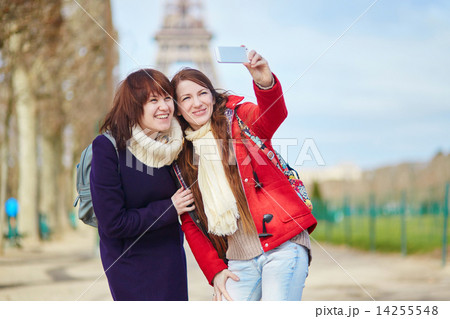 Two cheerful girls in Paris doing selfie Two cheerful girls in Paris doing selfie 14255548