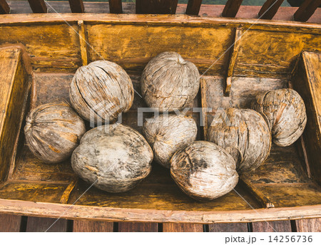Wooden boat full with coconuts Wooden boat full with coconuts 14256736