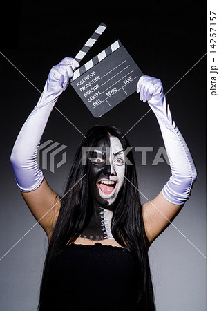 Scary monster with movie board Scary monster with movie board 14267157