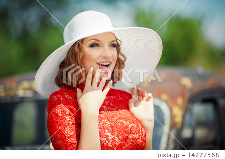 Beautiful woman in white hat expresses the joyful emotions Beautiful woman in white hat expresses the joyful emotions 14272368