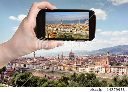 tourist taking photo of Florence skyline 14279938