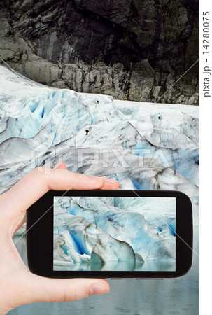 taking photo of snow briksdal glacier in Norway 14280075