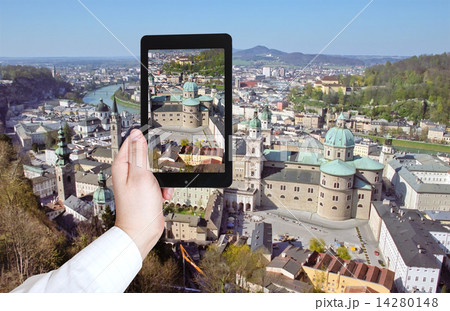 tourist taking photo of Salzburg panorama tourist taking photo of Salzburg panorama 14280148