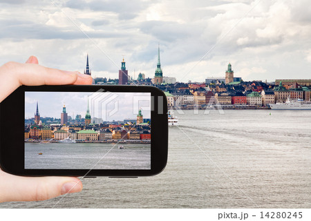 tourist taking photo panorama of Stockholm city tourist taking photo panorama of Stockholm city 14280245
