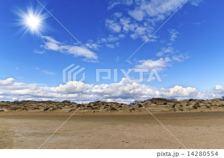 Sand hills and blue sky with clouds 14280554