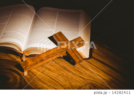 Open bible with crucifix icon Open bible with crucifix icon 14282411