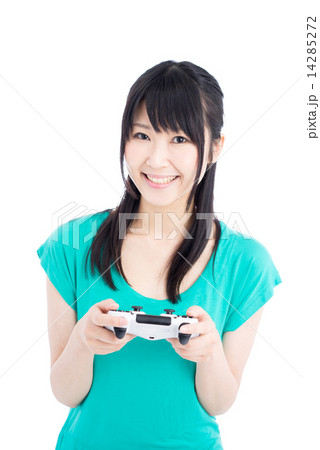 テレビゲームをする女性の写真素材