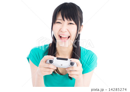 テレビゲームをする女性の写真素材